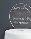 Christening Day Cake Topper - Clear Acrylic Cake topper in the shape of a circle against a black background and on a white plain cake. Engraved with "Baby Jacks Christening Day 30th April 2017" laser engraved, laser cut cake toppers Ireland