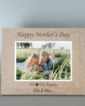 Personalised Mother's Day Photo Frame. Brown photo frame with a picture of two girls inlaid, it reads "Happy Mother's Day, We (heart) you Mammy. Ella & Mia xxx personalised gifts Ireland by The Craft Collection